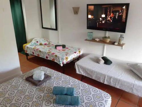 Giường trong phòng chung tại Studio Coco Passion