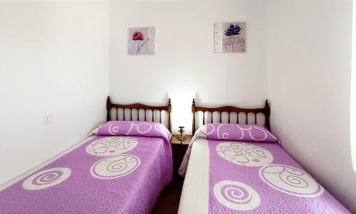 Postel nebo postele na pokoji v ubytování Casa Raspa