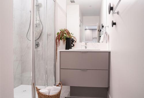 a bathroom with a shower and a sink at Galena by Revelstoke Vacations in Revelstoke