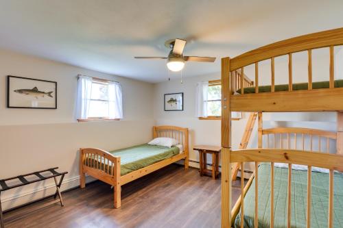 a bedroom with a bunk bed and a staircase at Waterfront Sidney Getaway with Private Dock! in Belgrade