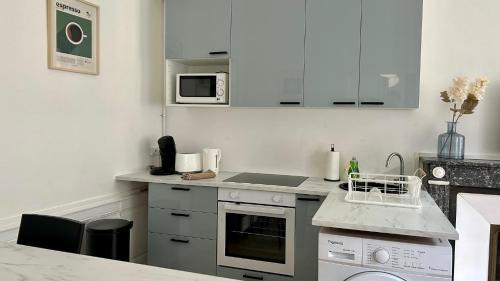 Una cocina o zona de cocina en L'authentique