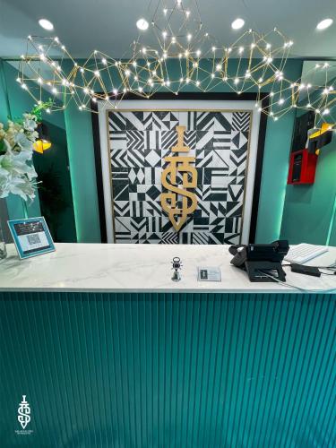 a counter in a room with lights on it at Saladin Boutique Hotel in Jerusalem