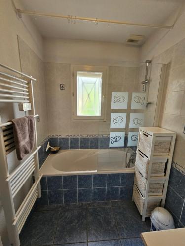 Koupelna v ubytování Agréable maison climatisée idéalement placée pour 6personnes vieux boucau