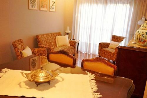 Posezení v ubytování Clásico y moderno departamento - olivos