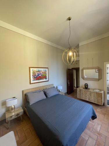 Katil atau katil-katil dalam bilik di Villa Natalina B&B