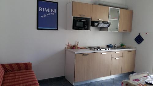 Una cocina o zona de cocina en Residence Désirée