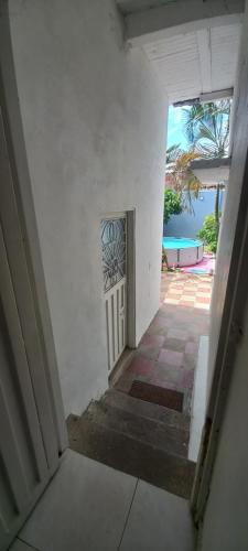 Katil atau katil-katil dalam bilik di Casa acogedora en girardot