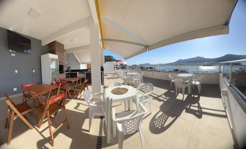 Restoran ili drugo mesto za obedovanje u objektu Suítes com Vista para o Mar no Marinas - Mirante do Marinas