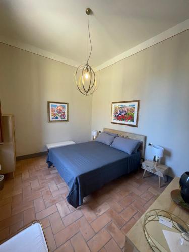 Katil atau katil-katil dalam bilik di Villa Natalina B&B