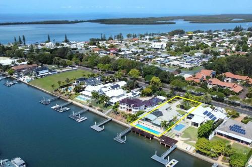 an aerial view of a harbor with boats in the water at Sunshine Coast Dream Getaway in Pelican Waters