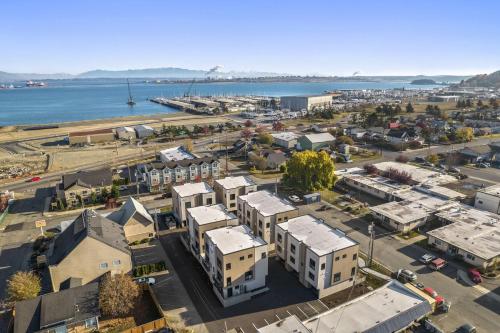 an aerial view of a city with a harbor at BRAND NEW Fully Updated Condo 918 in Anacortes in Anacortes