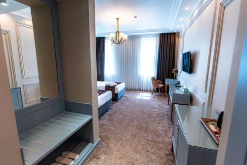 Katil atau katil-katil dalam bilik di Bravo Hotel