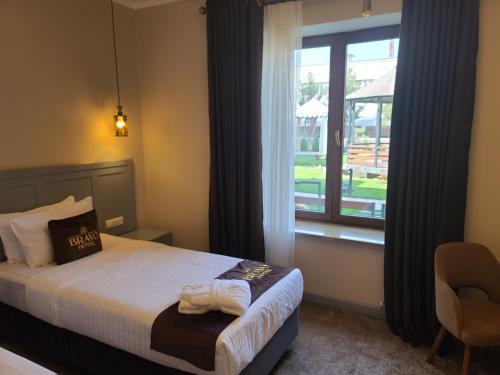 Katil atau katil-katil dalam bilik di Bravo Hotel