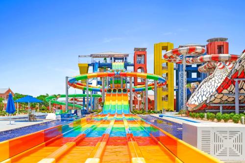 a water park with a roller coaster at Pickalbatros Jungle Aqua Park - Neverland Hurghada in Hurghada