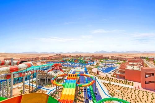 a view of a water park with a roller coaster at Pickalbatros Jungle Aqua Park - Neverland Hurghada in Hurghada
