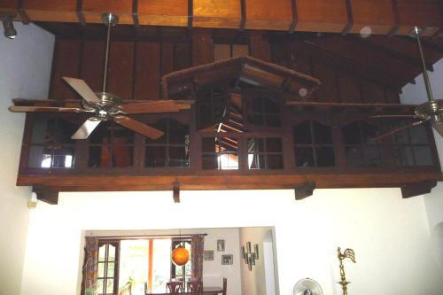 a ceiling in a room with a ceiling fan at Cinnamon Bungalow in Negombo