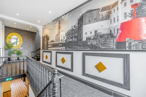 a hallway with a mural on the wall at Bank Apartments in Boston