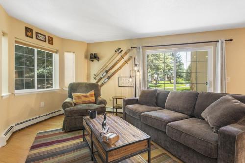 a living room with a couch and a chair at 901 Crazy Horse Circle condo in Edwards