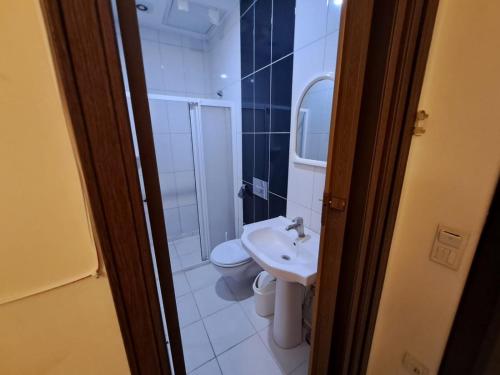 a bathroom with a toilet and a sink at Elda Aşk Masalı in Side