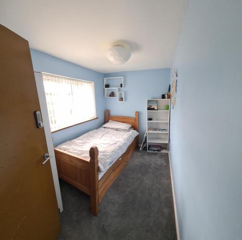 Postel nebo postele na pokoji v ubytování Homely Home