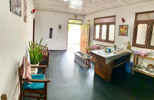 a room with a sink and a counter in a room at Surfing Waves Madiha in Matara