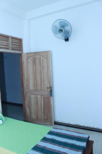 Postel nebo postele na pokoji v ubytování Imagine Villa Midigama