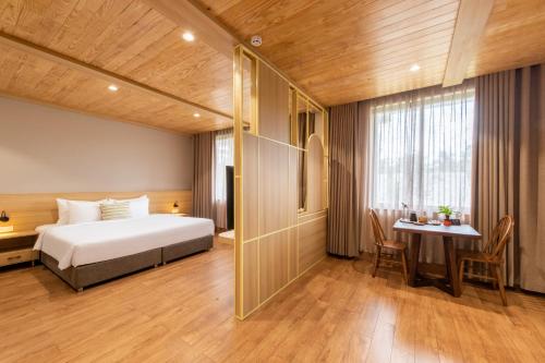 Ein Bett oder Betten in einem Zimmer der Unterkunft Hami Garden - Authentic & Natural Resort