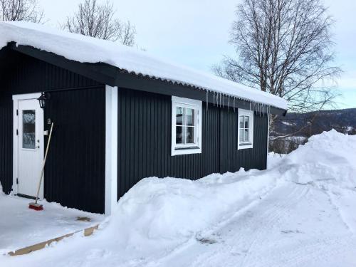 Hyttgårdens stugby i Huså, Åre kommun v zimě
