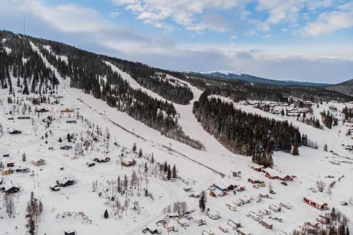 Το Hyttgårdens stugby i Huså, Åre kommun τον χειμώνα