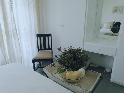 Una cama o camas en una habitación de Beachfront at 22 Settler's Sands