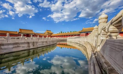 a bridge over the water in the forbidden city at Happy Dragon Hotel -close to Forbidden City&Wangfujing Street,Newly renovated with tour service in Beijing
