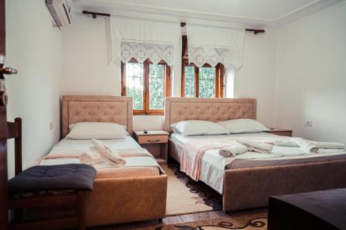 Guesthouse Arberにあるベッド