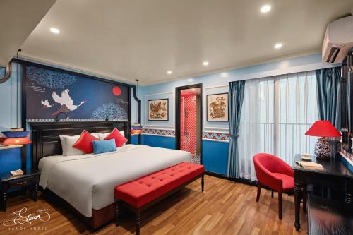 Postel nebo postele na pokoji v ubytování Eliana Signature Hanoi Hotel