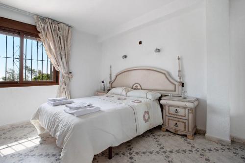 Ένα ή περισσότερα κρεβάτια σε δωμάτιο στο Casa Torremuelle
