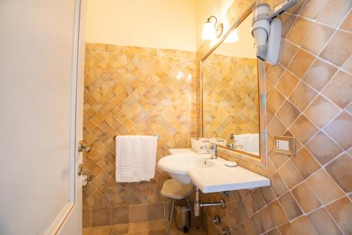 Koupelna v ubytování Hotel Daniel