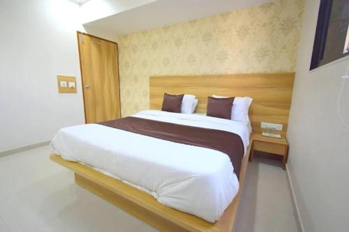 Postel nebo postele na pokoji v ubytování Hotel Midnight