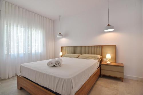 Postel nebo postele na pokoji v ubytování Villa Montgo