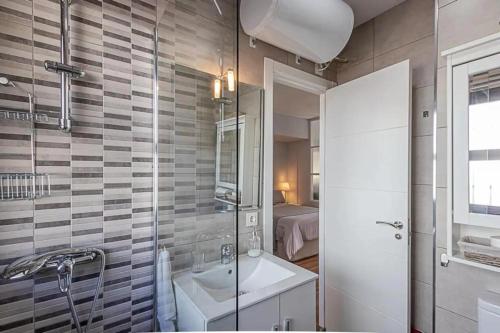 Koupelna v ubytování Encantador apartamento en primera línea de playa