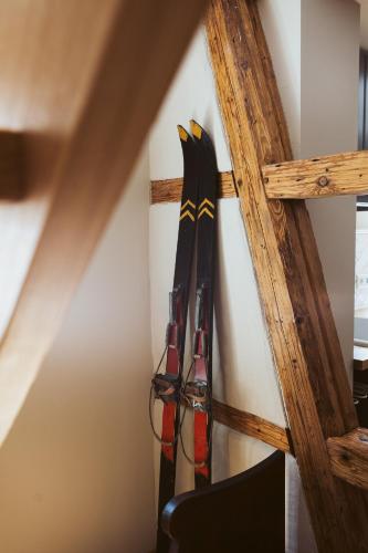 a group of skis hanging on a wall at Flecksches Gut in Leipzig