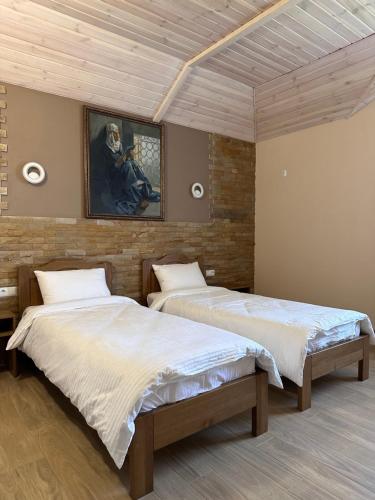 Postel nebo postele na pokoji v ubytování Maestro