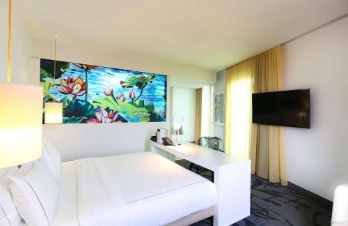 Μια τηλεόραση ή/και κέντρο ψυχαγωγίας στο art'otel cologne, Powered by Radisson Hotels