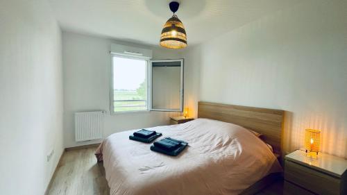 Llit o llits en una habitació de Appartement vue Baie de Canche - Dundee 2