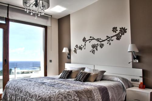Katil atau katil-katil dalam bilik di Hotel Naturaleza Mar da Ardora Wellness & Spa