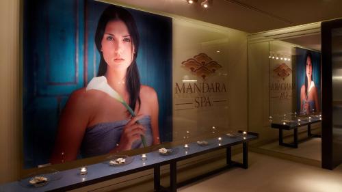 a painting of a woman on a wall in a room at Park Plaza London Westminster Bridge in London