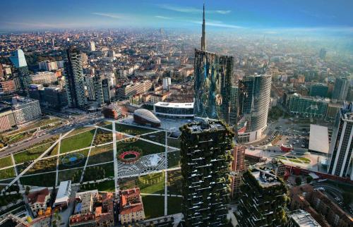 an aerial view of a city with tall buildings at Fiera Milano City Apartment in Milan