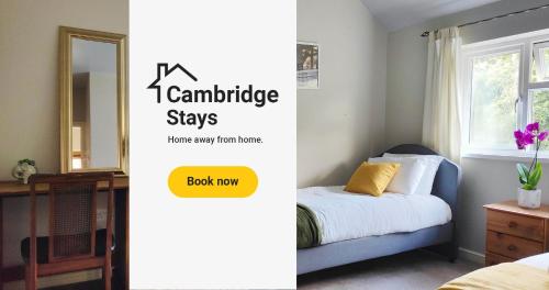 Cambridge Stays 3BR House-Garden-Lots of Parking-15 min to City Center- Close to Cambridge Science park في كامبريدج: غرفة نوم بسرير ومرآة
