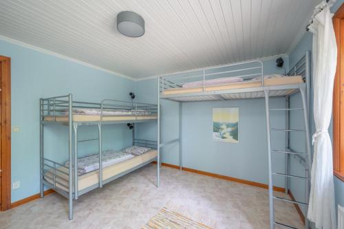 Ένα ή περισσότερα κρεβάτια σε δωμάτιο στο Tyngsjö Vildmark