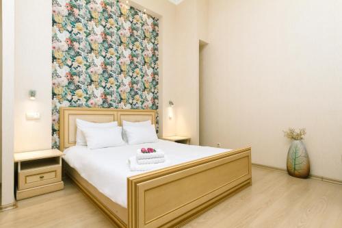 Ένα ή περισσότερα κρεβάτια σε δωμάτιο στο Apartment Baseina Khreschatyk