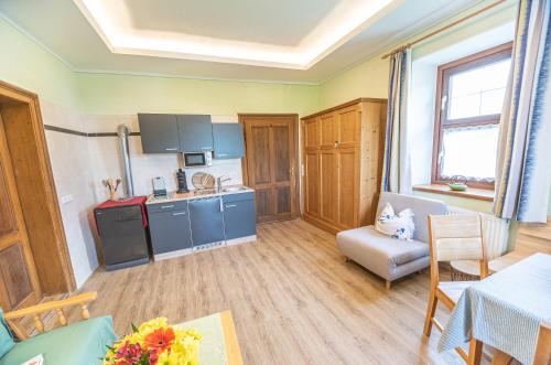 Kuchyň nebo kuchyňský kout v ubytování Hotel Gasthof Gribelehof