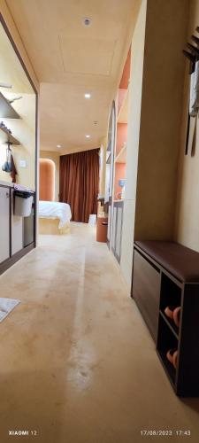 a large room with a bed and a room with at Bstudio in APEC Mandala Mũi Né in Phan Thiet